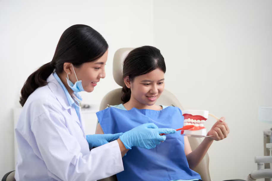 Dentist explaining General Dentistry on a patient