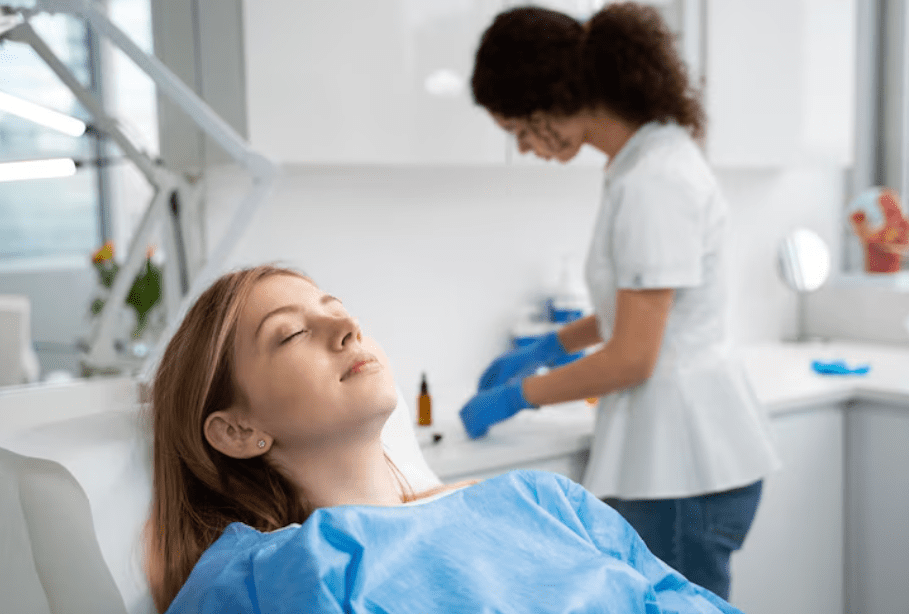 A peaceful patient resting in a dental chair, highlighting the stress-free experience of sedation dentistry.