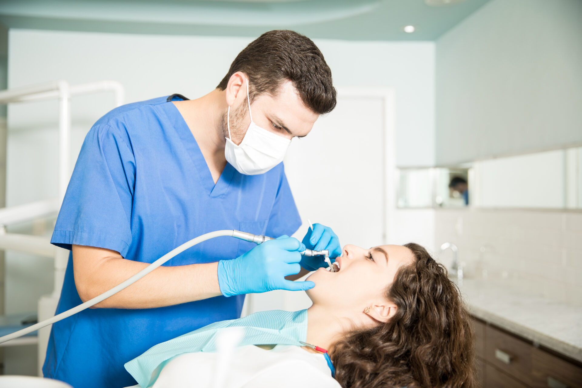 Dentist performing Sedation Dentistry on a patient